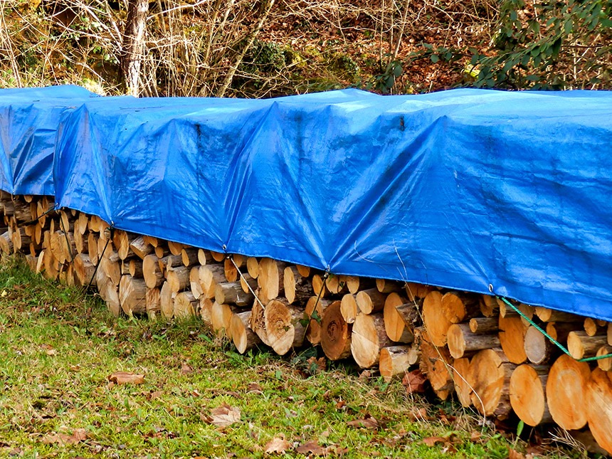 firewood-covered-by-tarp.jpg